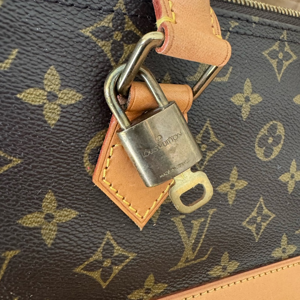 Louis Vuitton Brown Monogram Duffel Bag with Vachetta Leather - Picture 14 of 14